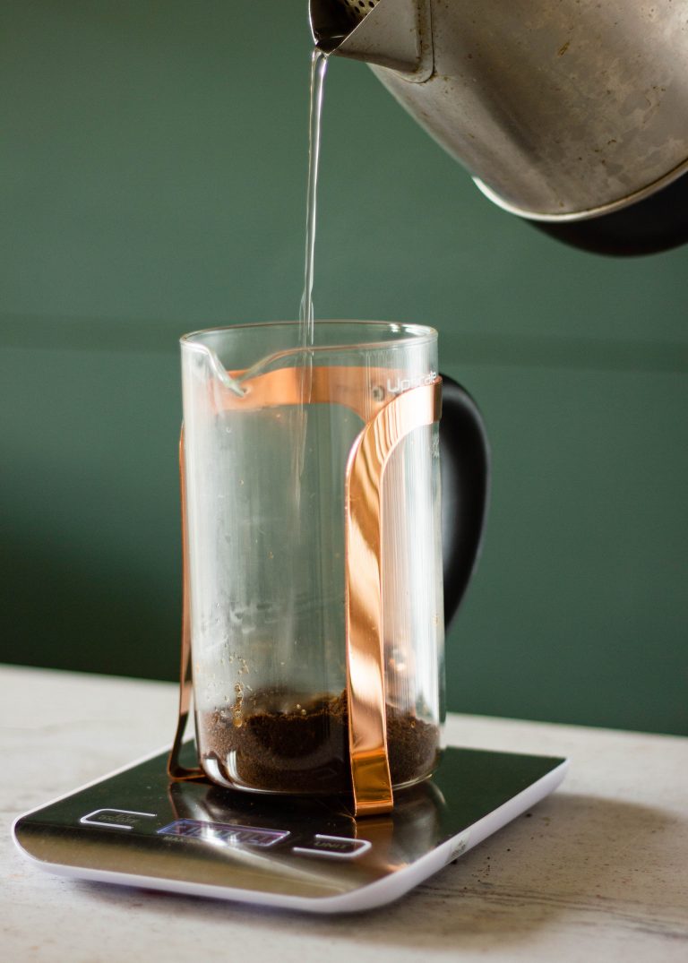Image showing ouring water to bloom coffee